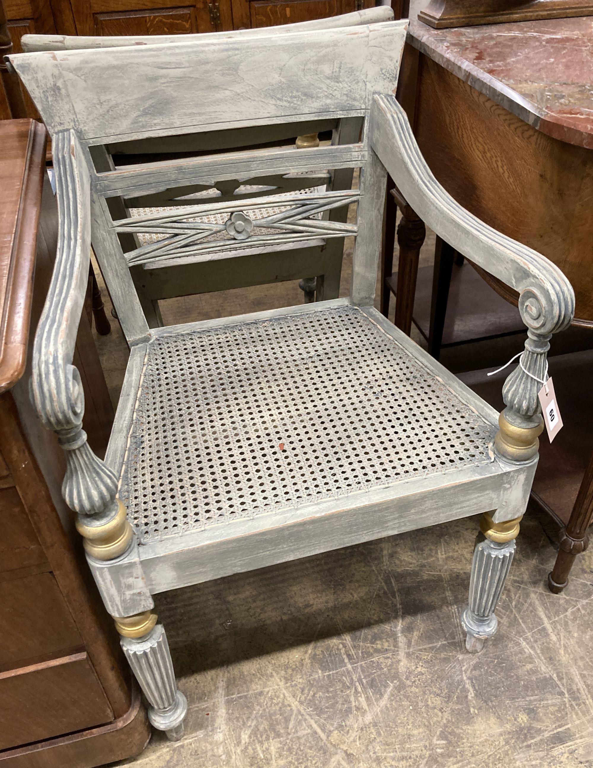 A pair of Dutch colonial style painted cane seat dining chairs, width 55cm, depth 50cm, height 86cm